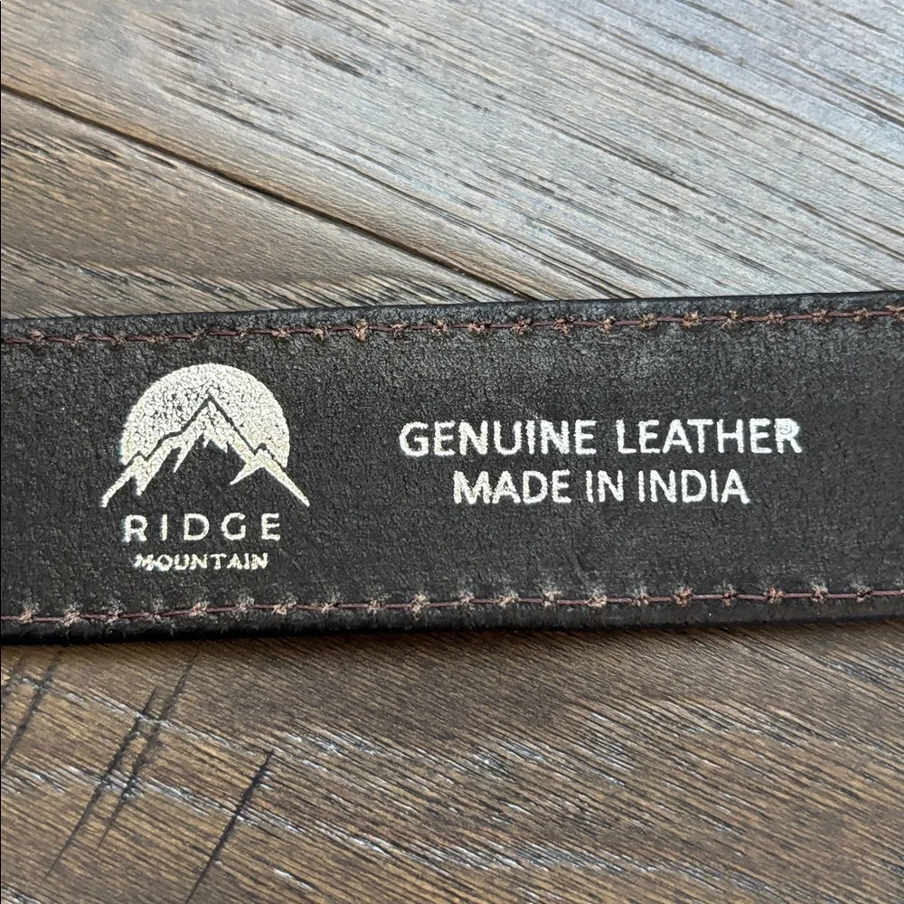 Ridge Mountain Genuine tooled leather,single stitch, silvertone embossed buckle